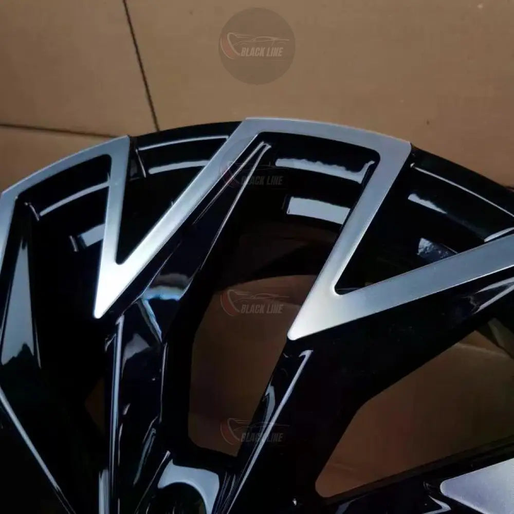 Llantas Deportivas Estilo Volkswagen con Diseño Turbina Angular – Negro y Plata