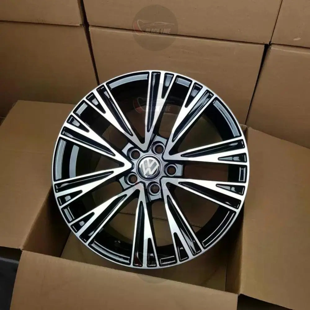 Llantas Deportivas Estilo Volkswagen con Radios Angulares – Negro y Plata