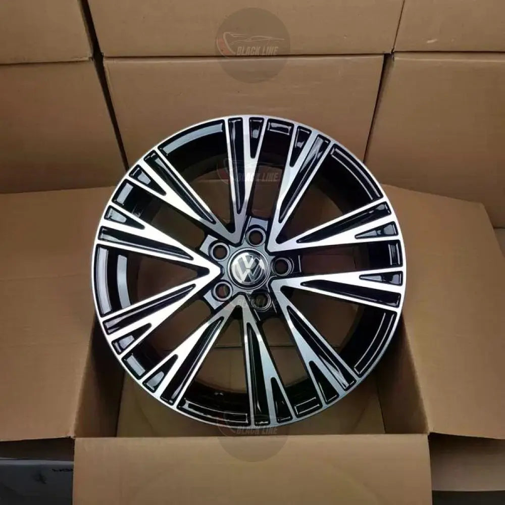 Llantas Deportivas Estilo Volkswagen con Radios Angulares – Negro y Plata