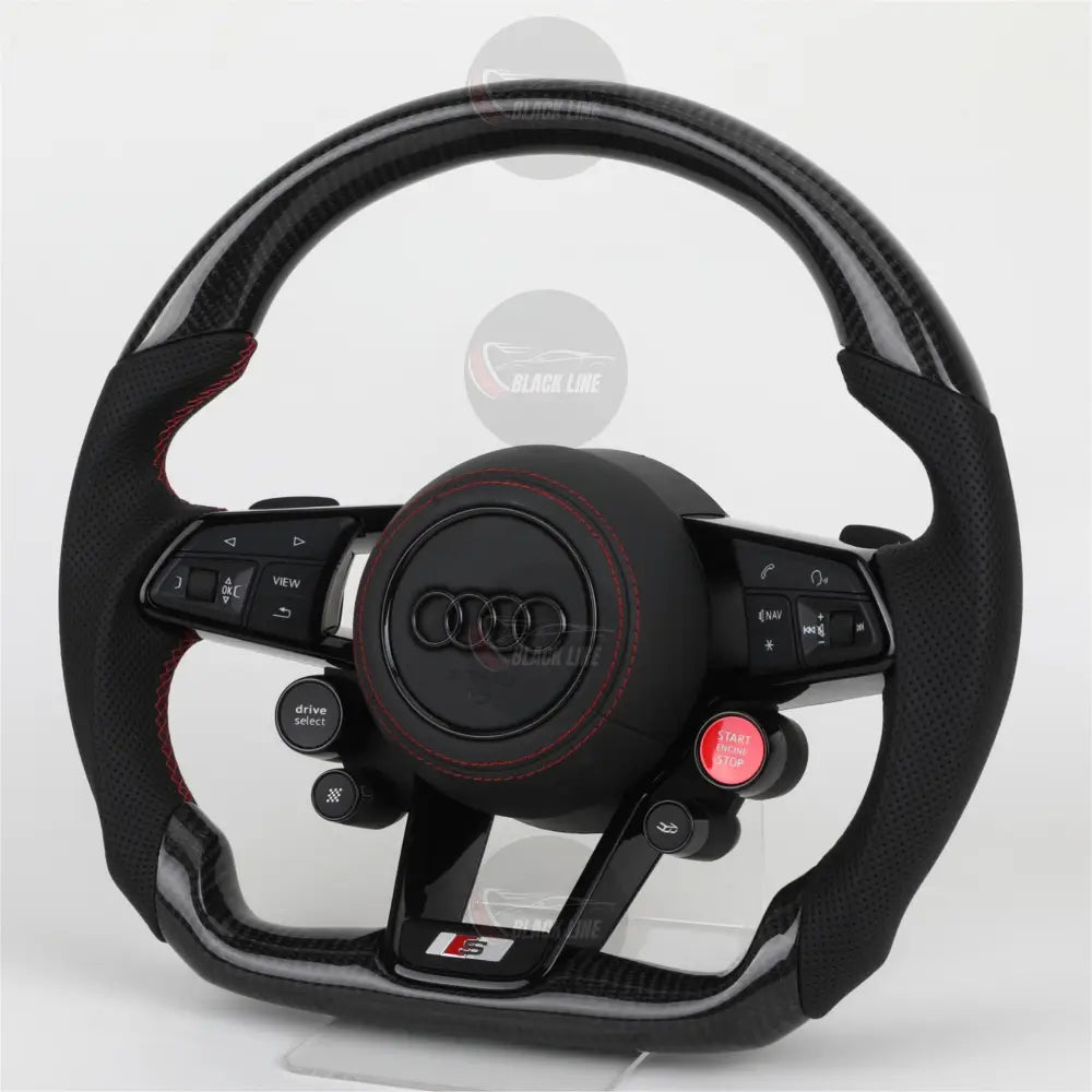 Volante Audi S deportivo en fibra de carbono cuero perforado y costuras rojas con airbag incluido