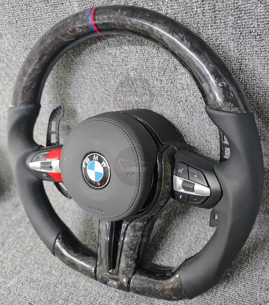 Volante BMW M Deportivo en Carbono Forjado y Piel Negra | Botones M1/M2 Levas de Carbono Fondo Plano y Airbag