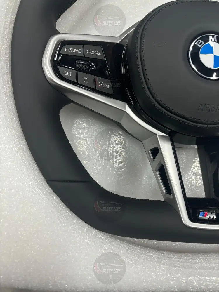 Volante BMW M Deportivo en Piel Negra | Fondo Plano Mandos Multifunción Detalles Plateados y Airbag