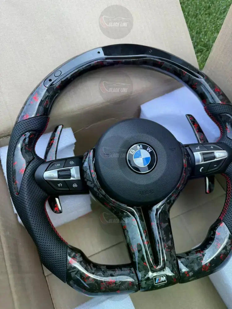 Volante BMW M Performance en Acabado Carbono Negro con Detalles Rojos Levas M1/M2 y Multifunción
