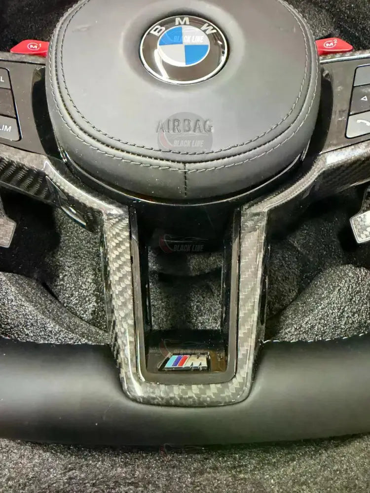 Volante BMW M Performance en Cuero Negro con Fibra de Carbono Levas y Botones M1/M2