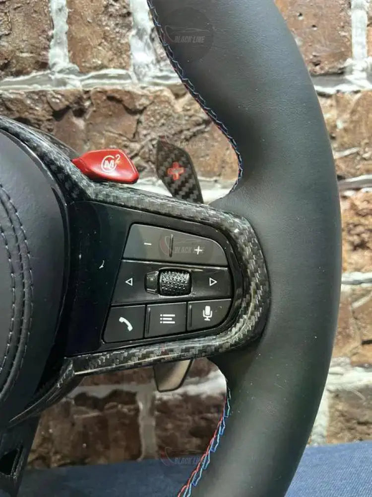 Volante BMW M Performance en Cuero Negro y Fibra de Carbono con Botones M1/M2 Levas y Multifunción