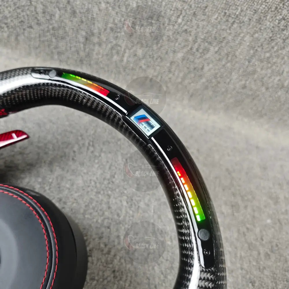 Volante BMW M Performance en Fibra de Carbono Alcantara y Detalles Rojos con Race Display Levas y M1/M2