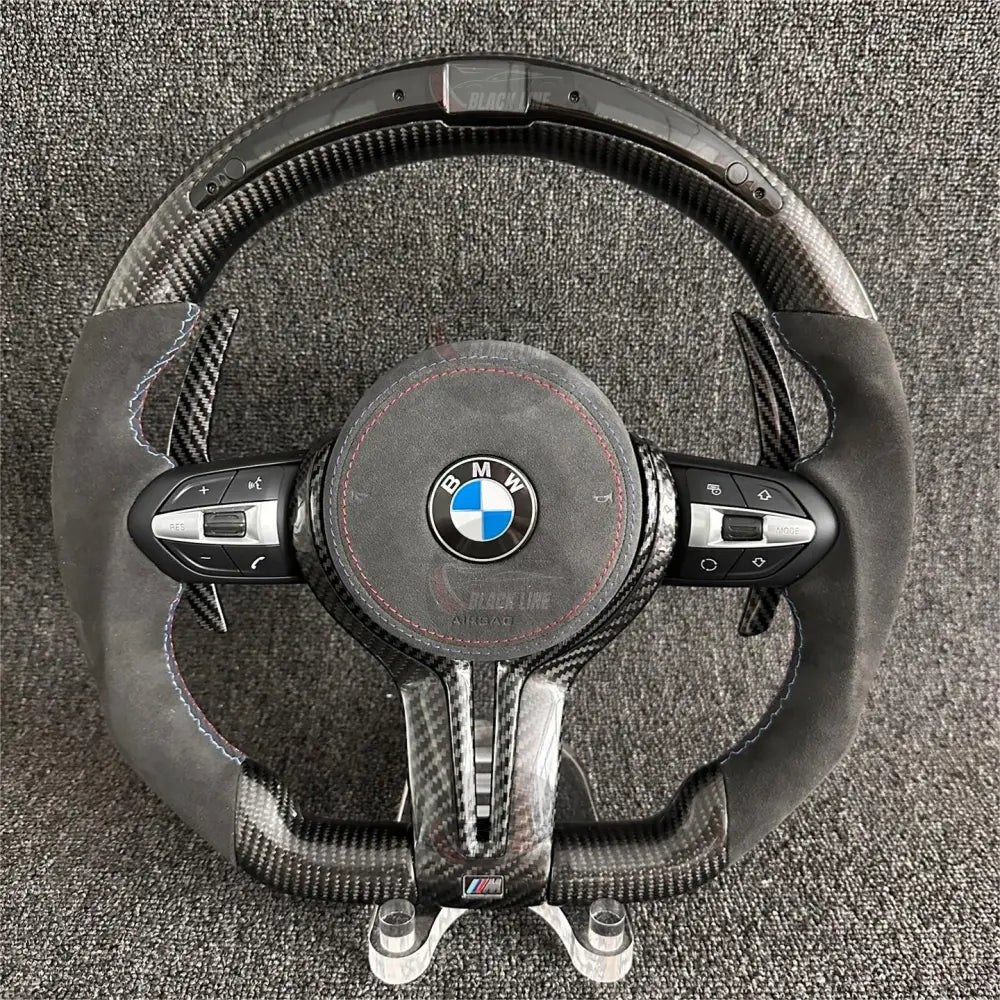 Volante BMW M Performance en Fibra de Carbono y Alcántara | Display LED Levas de Carbono Multifunción Airbag y Costuras