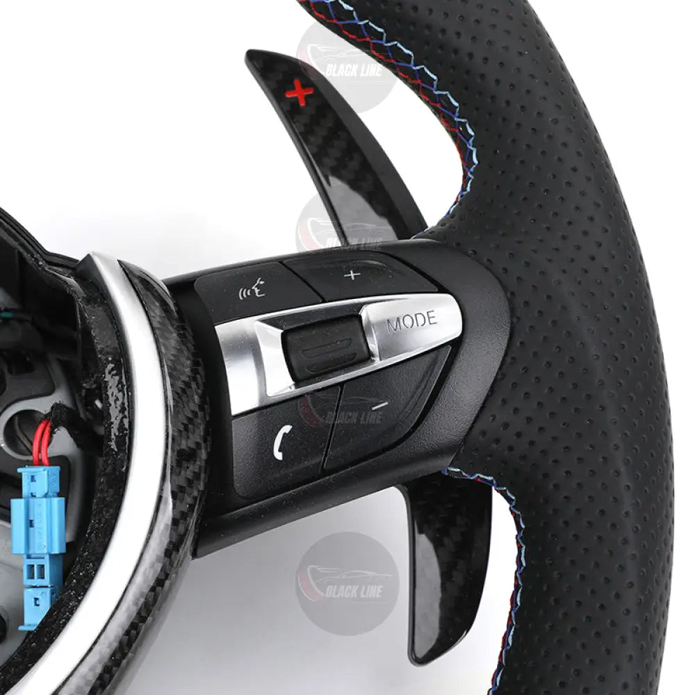 Volante BMW M Performance en Fibra de Carbono y Cuero Perforado con Race Display M1/M2 y Levas