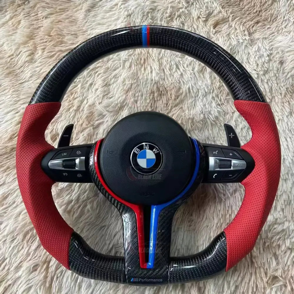 Volante BMW M Performance en Fibra de Carbono y Cuero Rojo Perforado con Levas Multifunción y Detalles M