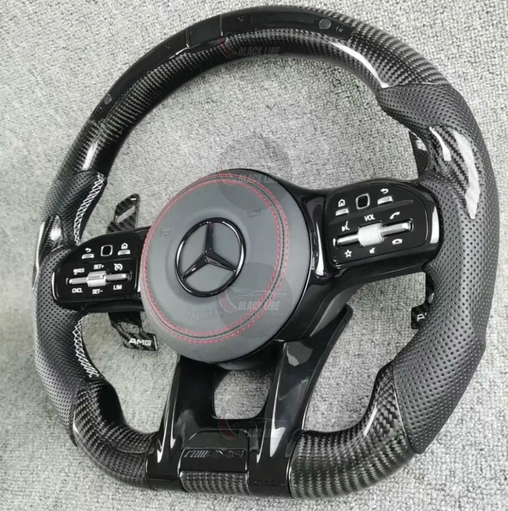 Volante Deportivo Mercedes-AMG de Carbono y Cuero Perforado con LED Levas y Airbag Incluido