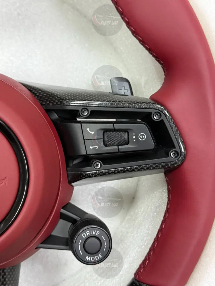 Volante Deportivo Porsche en Fibra de Carbono y Piel Roja con Levas y Controles Multifunción