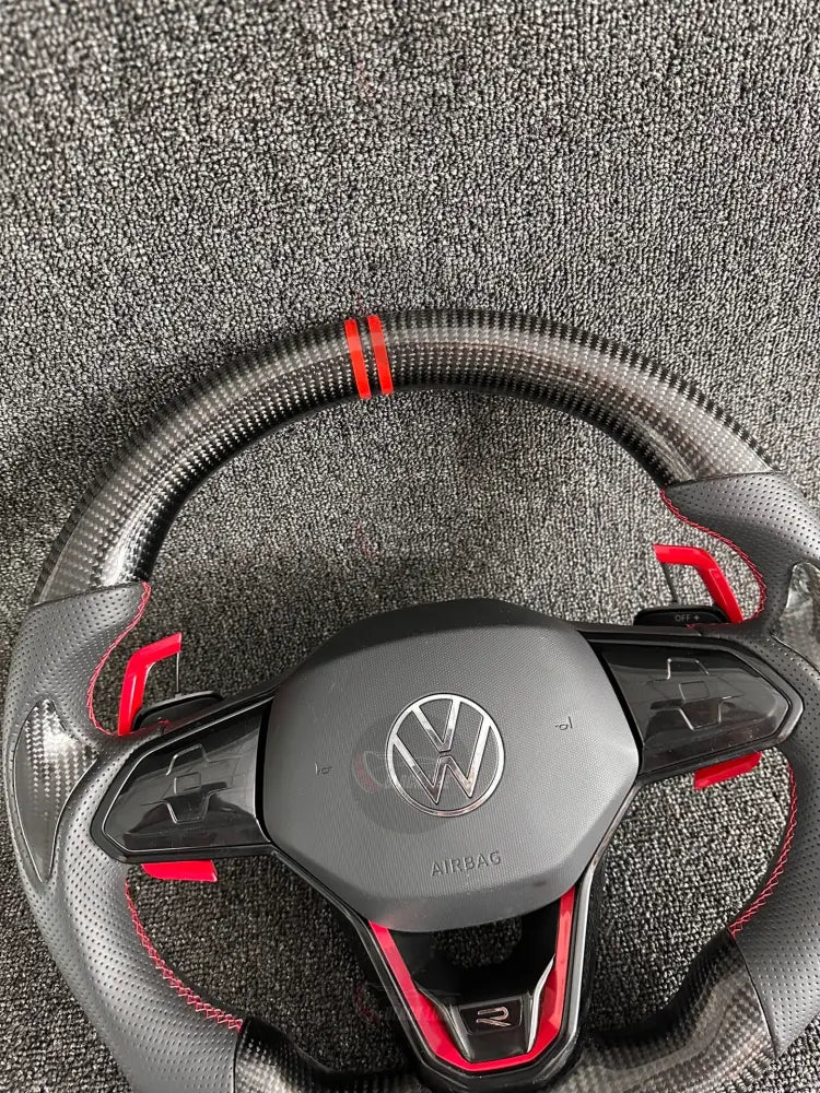 Volante Deportivo Volkswagen R de Carbono y Cuero Perforado con Costura Roja Levas Ampliadas y Airbag Incluido