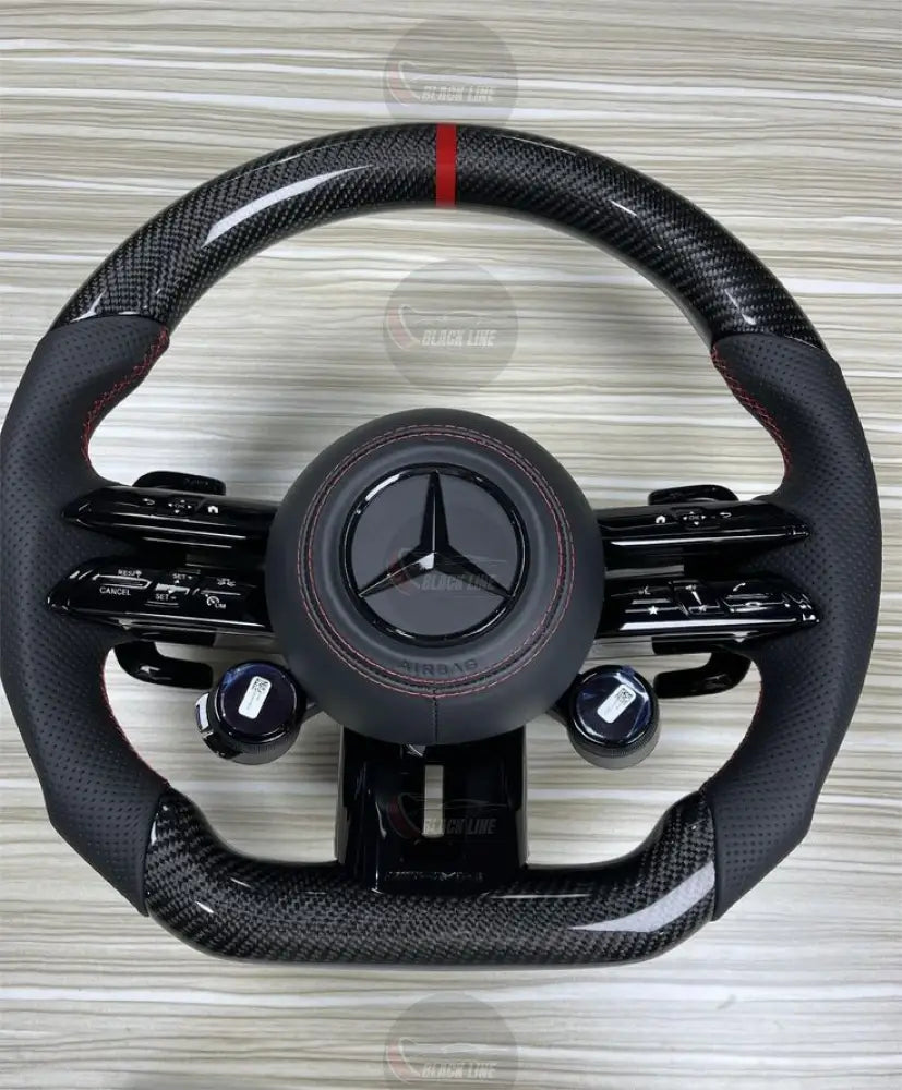 Volante Mercedes-AMG de Fibra de Carbono Cuero Perforado y Mandos Giratorios