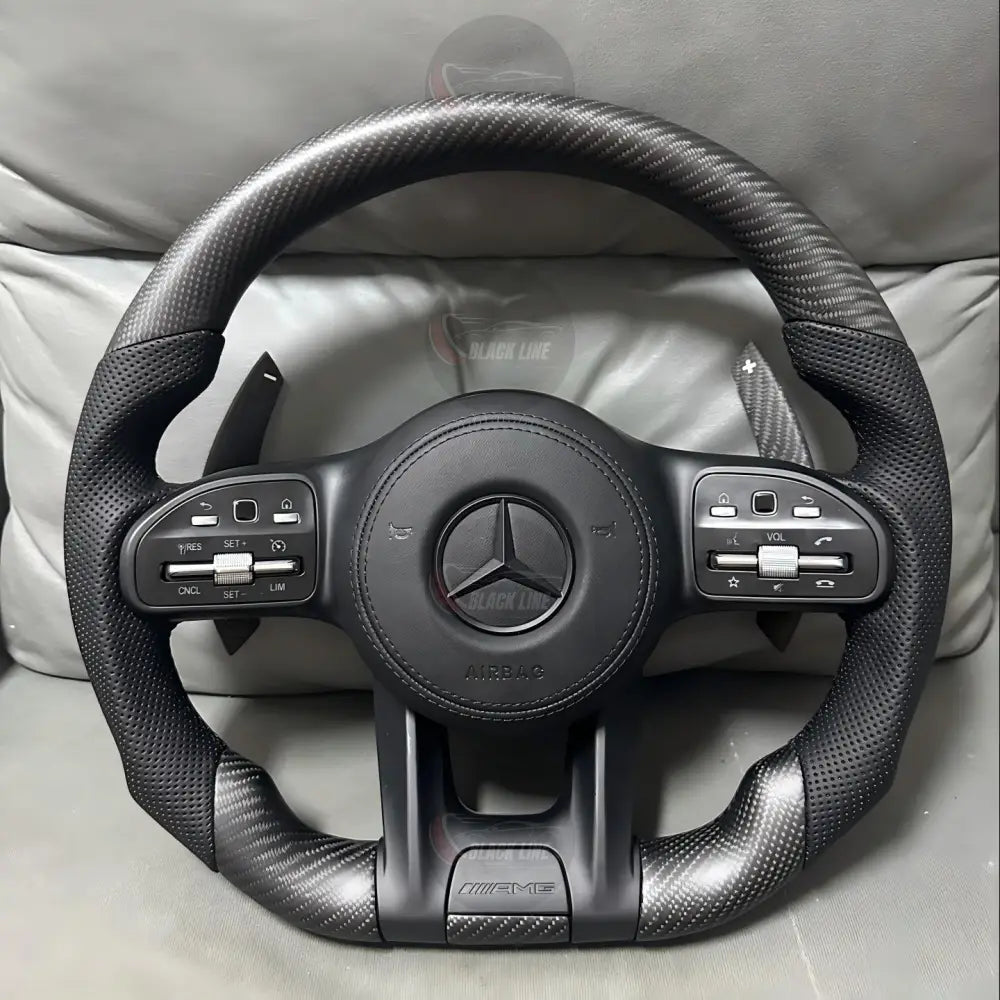 Volante Mercedes-AMG Performance en Acabado Carbono Cuero Perforado Levas y Multifunción