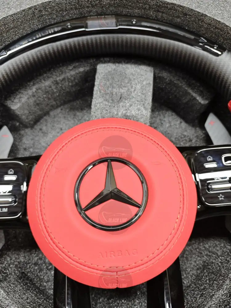 Volante Mercedes-AMG Performance en Fibra de Carbono Cuero Rojo Perforado y Levas