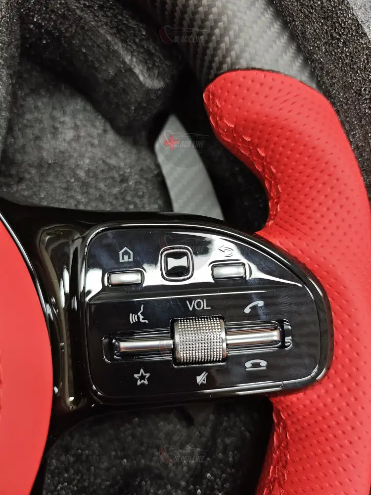 Volante Mercedes-AMG Performance en Fibra de Carbono Cuero Rojo Perforado y Levas