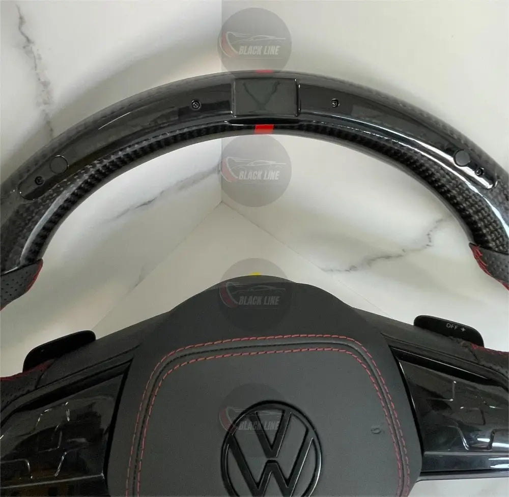 Volante Volkswagen Golf GTI Performance en Fibra de Carbono Cuero Perforado Levas y Costuras Rojas